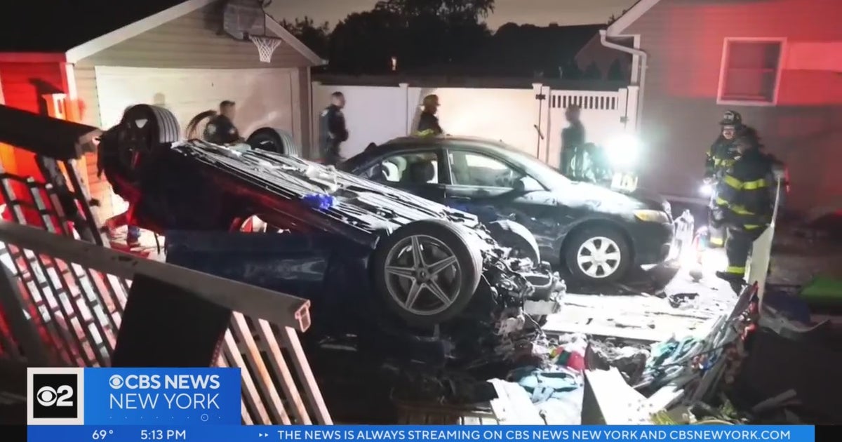 Car slams into 2 Long Island homes, narrowly misses residents - CBS New ...