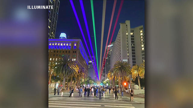 SF Pride rainbow laser art installation "Welcome" on Market Street. 
