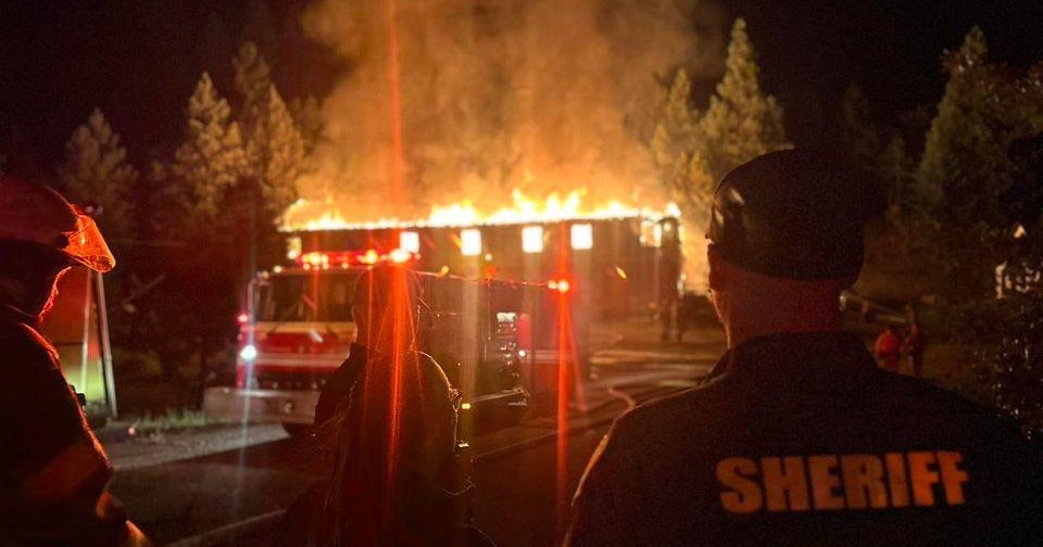 Structure in Quincy on flames due to a residential barbecue