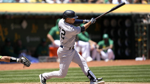 Isiah Kiner-Falefa #12 of the New York Yankees hits a sacrifice fly scoring Harrison Bader #22 against the Oakland Athletics in the top of the fourth inning at RingCentral Coliseum on June 29, 2023 in Oakland, California. 