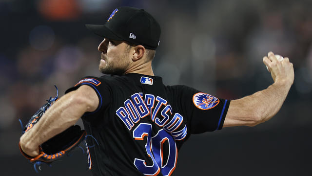 David Robertson #30 of the New York Mets throws a pitch during the eighth inning of the game against the San Francisco Giants at Citi Field on June 30, 2023 in New York City. 