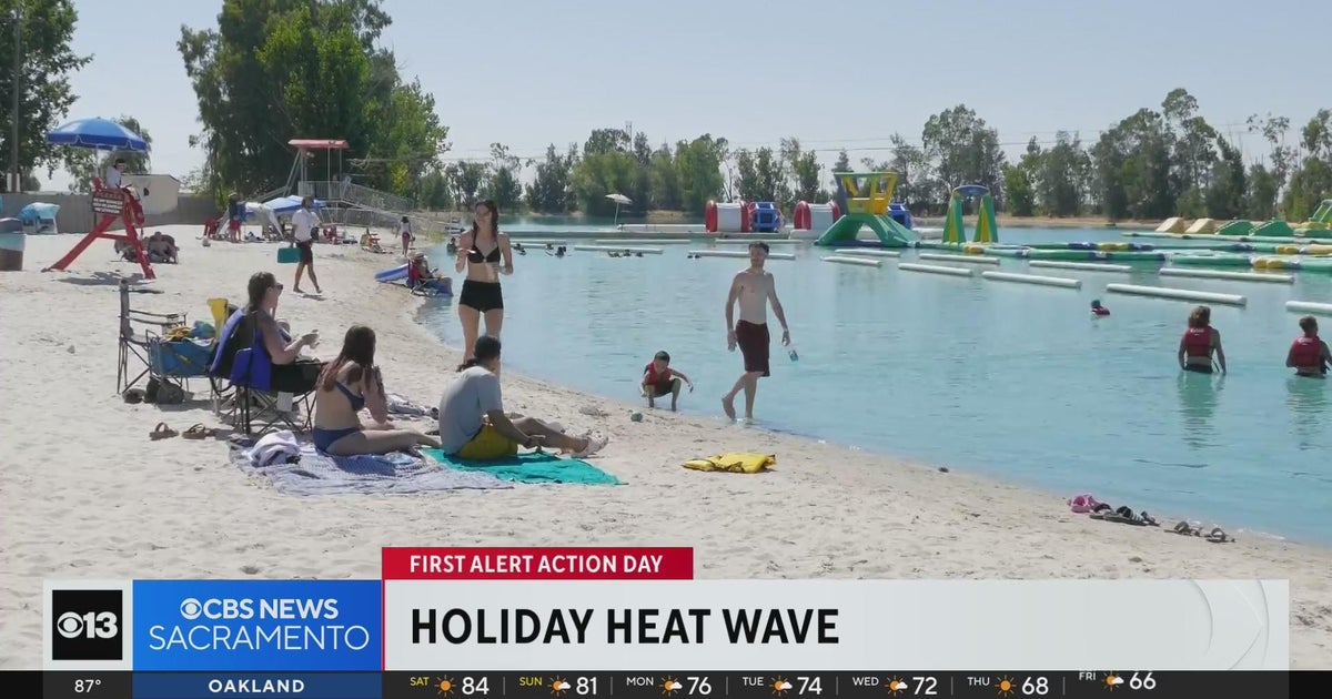 Crowds hit the water to try to stay cool amid heat wave