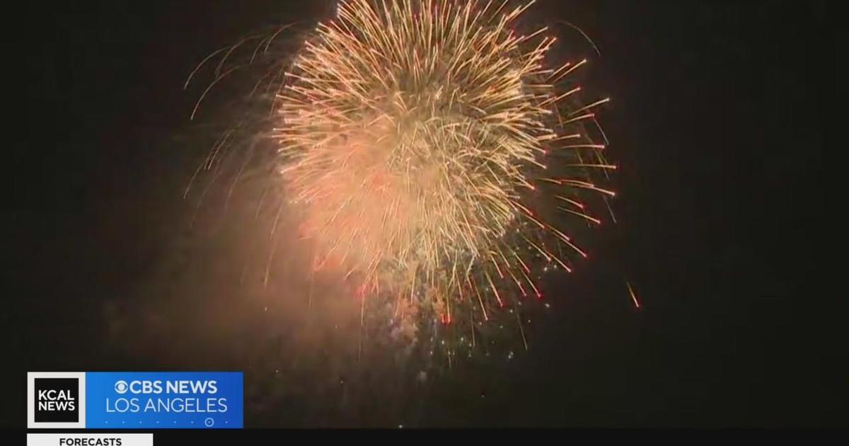 Fourth of July revelers enjoy fireworks at Huntington Beach's gigantic