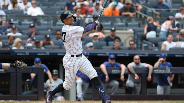 Giancarlo Stanton #27 of the New York Yankees hits a fifth inning two run home run against the Chicago Cubs during their game at Yankee Stadium on July 8, 2023 in Bronx borough of New York City. 