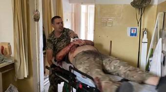 Front-line Ukraine clinic hit with carnage from a cluster bomb strike 