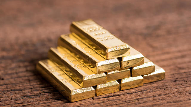 Should seniors buy gold bars and coins? Pros and cons to know