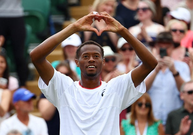 Christopher Eubanks of the U.S. celebrates winning his fourth round match against Greece's Stefanos Tsitsipas at the Wimbledon tennis championships in London, England, July 10, 2023