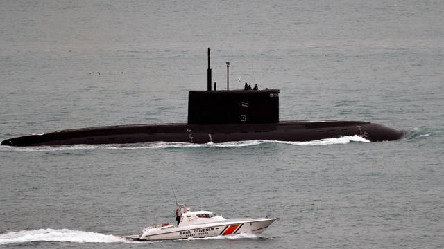 FILE PHOTO: Russian Kilo-class diesel-electric submarine Krasnodar sets sail in the Bosphorus, on its way to the Mediterranean Sea, in Istanbul 