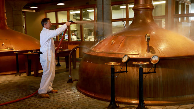 Brewer Eric Svendberg hoses brewing equipment at Anchor Brewing Co., located at 1705 Mariposa St.., in San Francisco, Calif., on Thursday, May 2, 2019. 