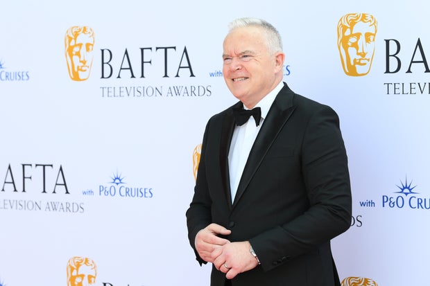 Huw Edwards named by wife as BBC presenter accused of sexual misconduct; police say no crime committed