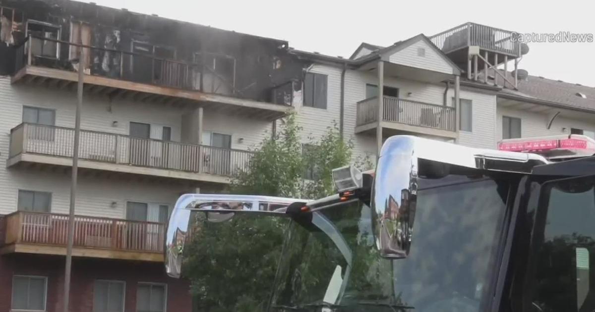 Schaumburg apartment fire sends 3 people to the hospital - CBS Chicago