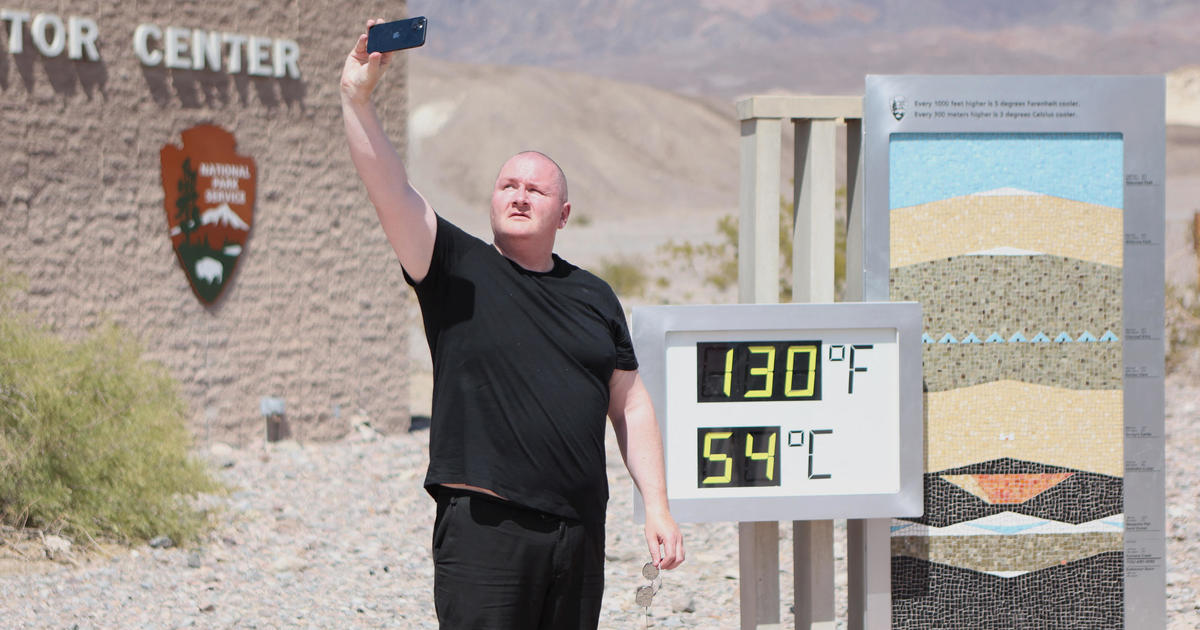 Death Valley, hottest place on Earth, hits near-record high as blistering heat wave continues