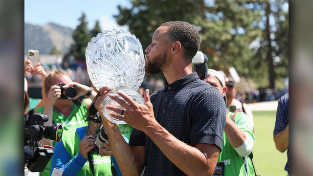 Steph Curry Kisses Golf Championship Trophy 