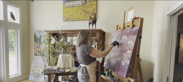 Kim Rhoney is a painter who draws inspiration from her home surrounded by farmland in Milan. 