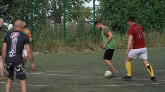 Ukrainian soldiers play soccer just miles from the front line 