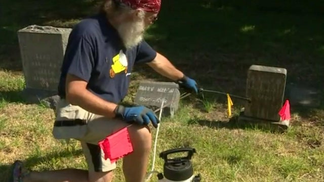 rene-amy-cleans-a-headstone.jpg 