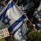 Israeli parliament passes law limiting Supreme Court power amid mass protests