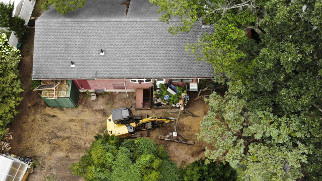 Authorities continue to work at the home of suspect Rex Heuermann in Massapequa Park, N.Y., July 24, 2023. 