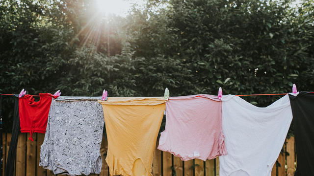 Damp clothing hanging on a washing line 