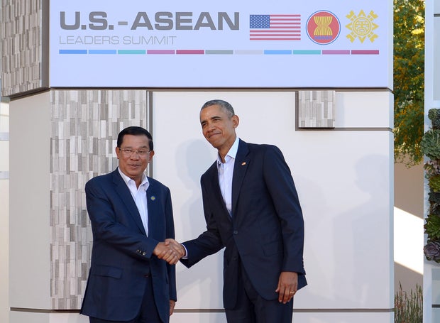 President Barack Obama greets Cambodia's Prime Minister Hun Sen upon arrival at Sunnylands estate for a meeting of the Association of Southeast Asian Nations (ASEAN) on February 15, 2016, in Rancho Mirage, California.