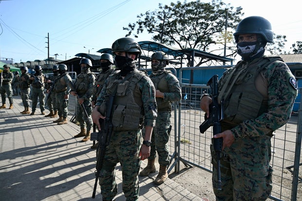 Ecuador prison riot leaves 31 dead as gangs war in packed facility