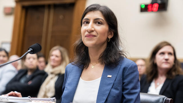 FTC Chair Lina Khan prepares to testify at a House Judiciary Committee hearing 