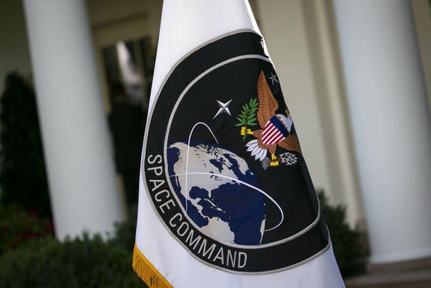 A U.S. Space Command flag is displayed during a ceremony in the Rose Garden of the White House on Thursday, Aug. 29, 2019. 