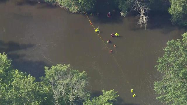 An aerial view of the Millstone River as emergency personnel search the water. 