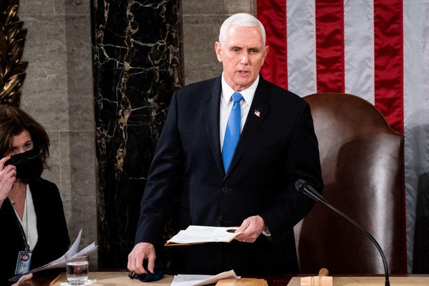 Vice President Mike Pence presides over a joint session of Congress to certify the 2020 Electoral College results on Jan. 6, 2021.
