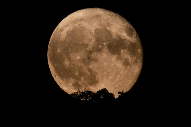 Super Moon In August Shines In The Night Sky of Turin 