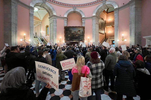 Protesters gather inside the Ohio Statehouse on May 3, 2023, in Columbus to protest a group of Republican legislators' attempt to make it harder to pass constitutional amendments.