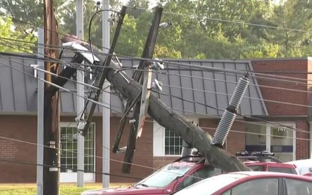 utility-pole-on-car-after-storm-in-westminster-maryland-080723.jpg 