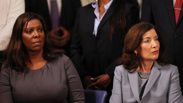 NY Attorney General Letitia James and NY Gov. Kathy Hochul listen as New York Mayor Eric Adams speaks during a press conference on gun violence prevention and public safety on July 31, 2023 in New York City. 