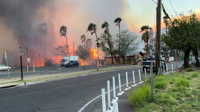 Smoke and flames rise in Lahaina, Hawaii, August 8, 2023, in this still image from video obtained from social media. 