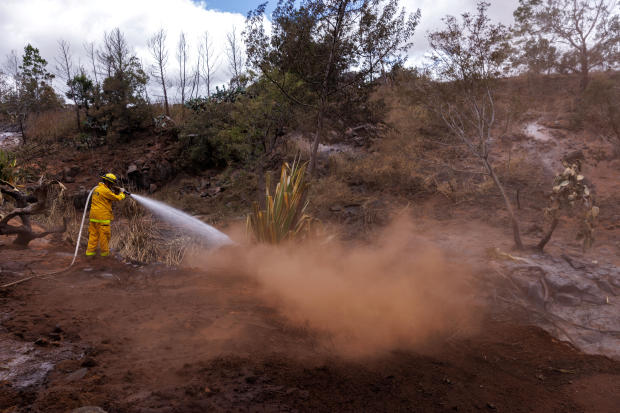 Maui County firefighters fight flare-up fires on the island 