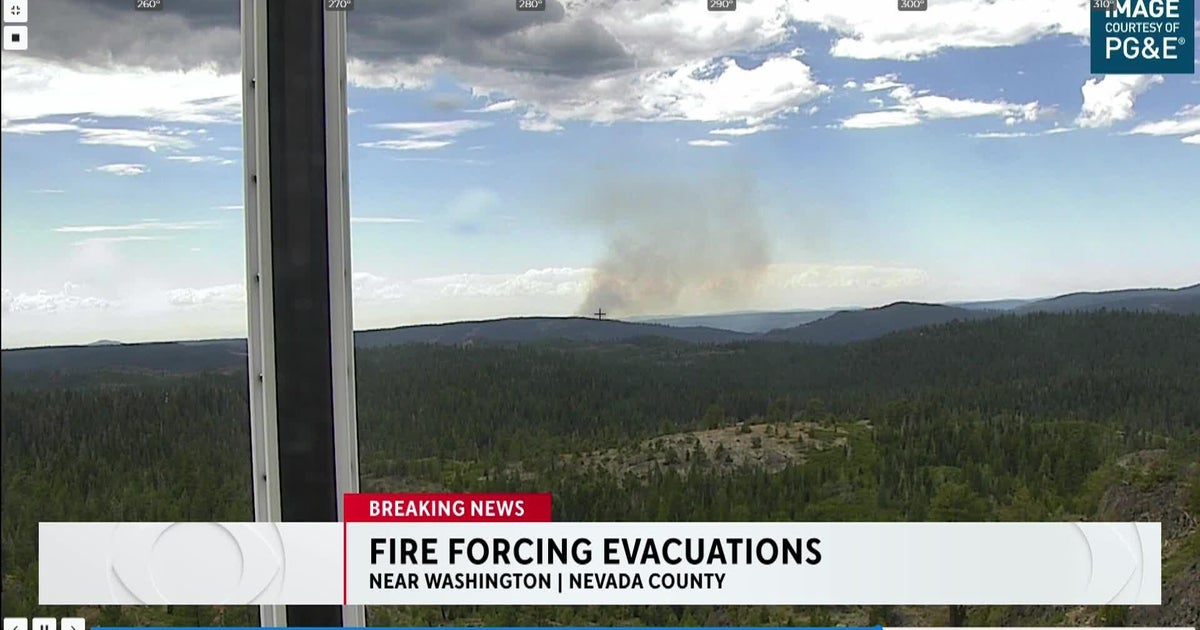 Forest fire threatening homes in Nevada County town of Washington