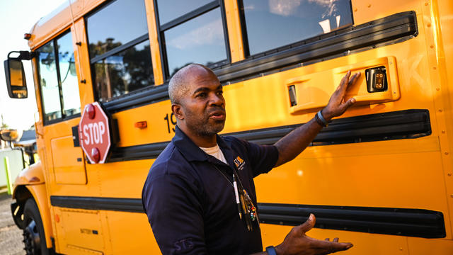 School bus driver shows traffic camera on bus on Long Island 