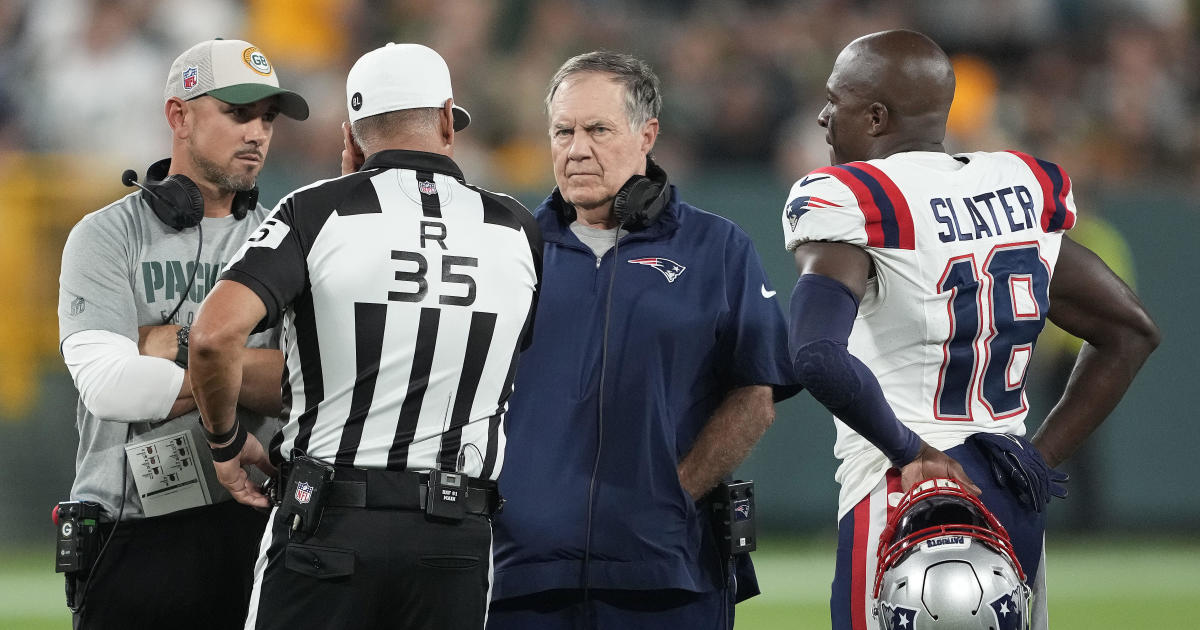 New England Patriots head coach Bill Belichick looks up to the replay  during the first half of an NFL football game against the Tennessee Titans,  Sunday, Nov. 28, 2021, in Foxborough, Mass. (