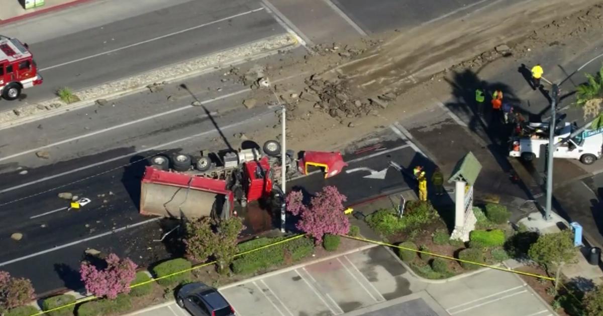 A dump truck accident shuts down the Arcadia intersection and creates a mess