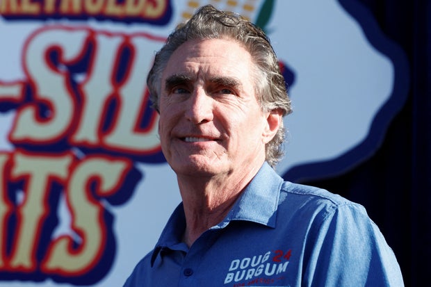 North Dakota Gov. Doug Burgum speaks at the Iowa State Fair in Des Moines, Iowa, August 11, 2023.