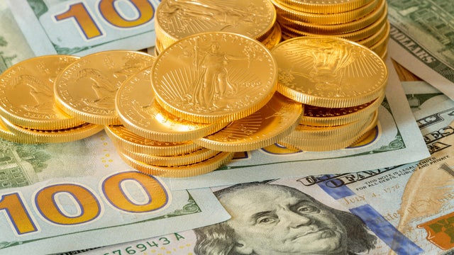 US dollar bills and coins background 