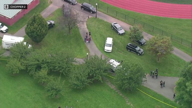 An aerial view of multiple law enforcement officers in Newark's West Side Park. 