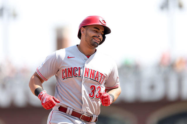 Christian Encarnacion-Strand of the Cincinnati Reds slides in safely  News Photo - Getty Images