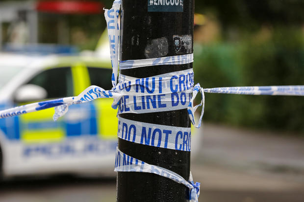 Police tape seen at the crime scene in London 