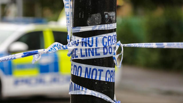 Police tape seen at the crime scene in London 