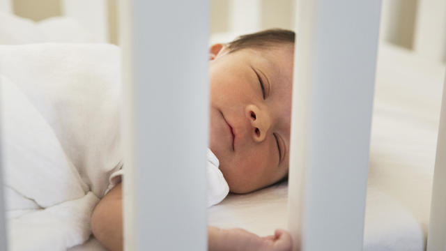 baby sleeping in crib 