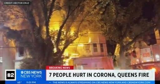 7 injured as flames spread between 2 Queens homes - CBS New York