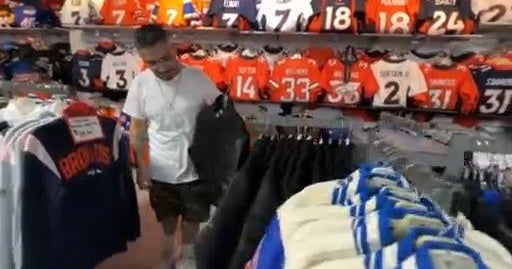 Sports apparel store near Empower Field at Mile High ready for new