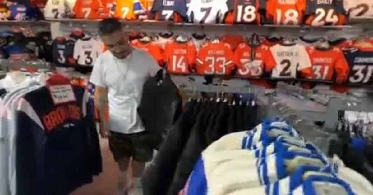 Sports apparel store near Empower Field at Mile High ready for new