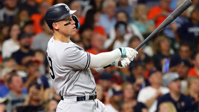 Aaron Judge #99 of the New York Yankees hits a solo home run in the third inning against the Houston Astros at Minute Maid Park on September 02, 2023 in Houston, Texas. 